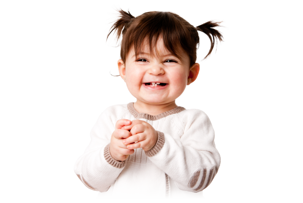 Young child with a wide excited smile